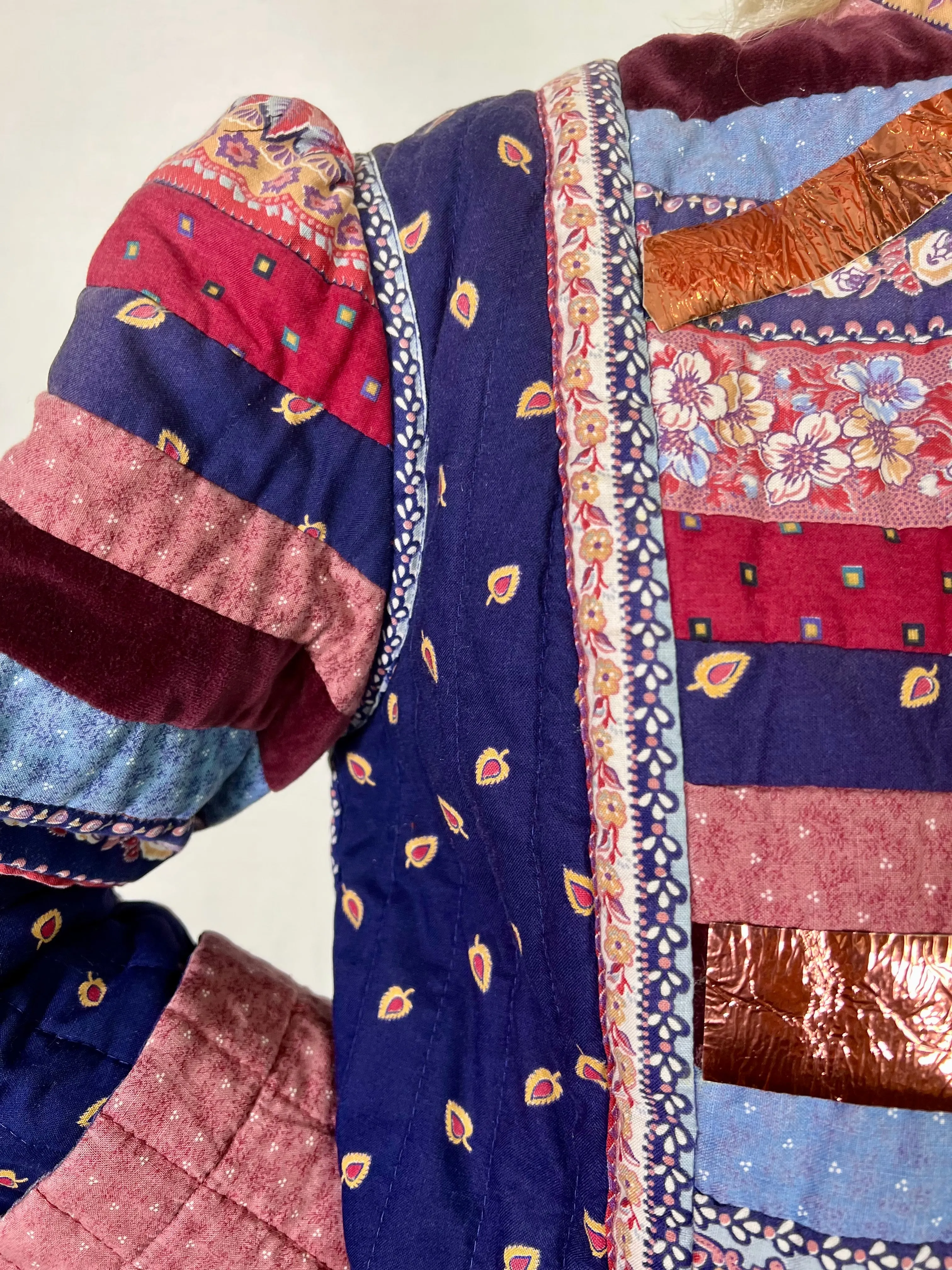 Sienna, patchwork 70s jacket with leather metallic butterfly